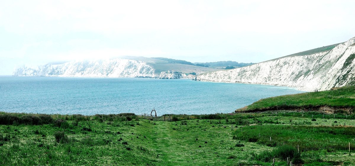 White chalk cliffs and turquoise water at Alum Bay on the Isle of Wight