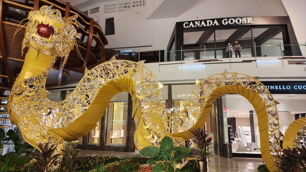 A huge golden dragon sculpture in a shopping arcade for Lunar New Year
