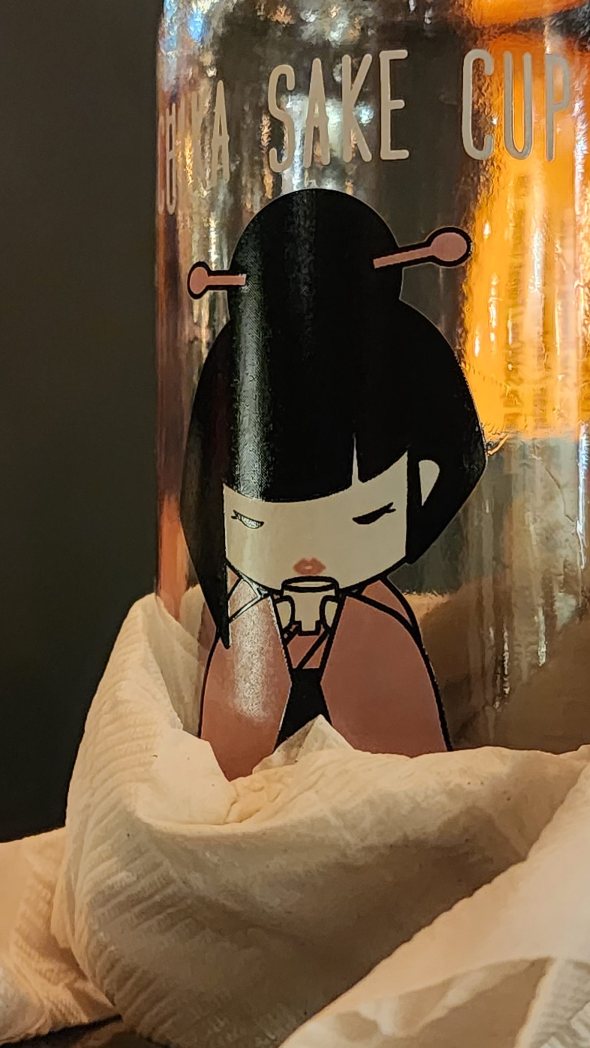 A minimalist Japanese-style art print of a figure in a dark kimono