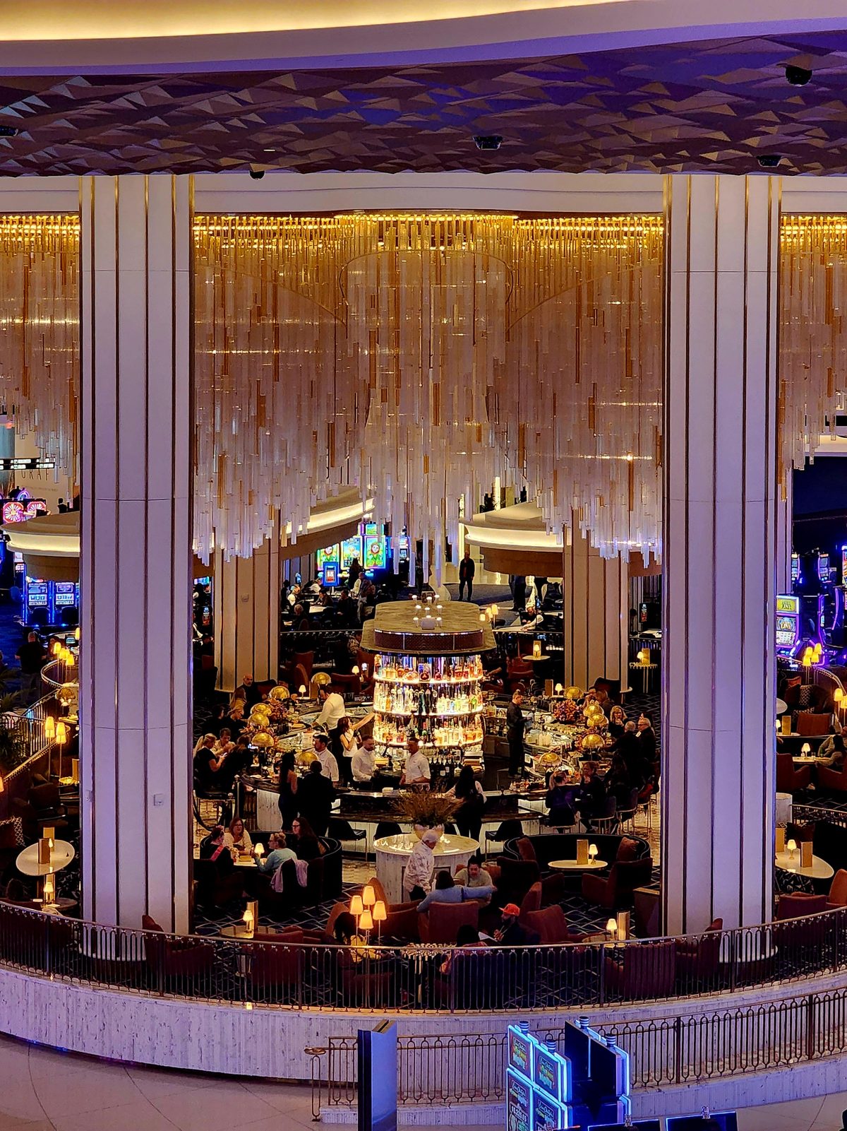 A lounge under a dramatic crystal chandelier in a Las Vegas resort