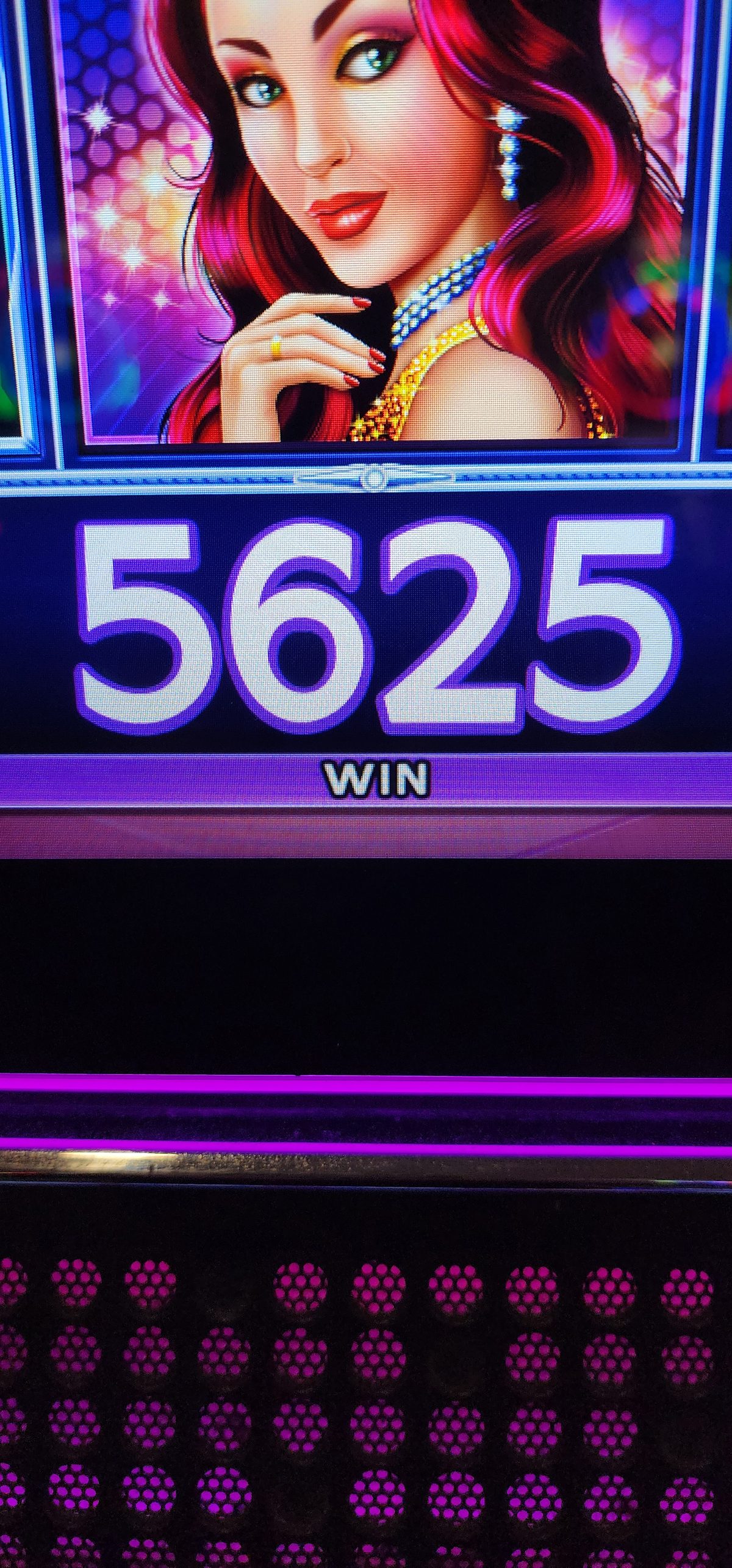 A slot machine screen showing a winning total
