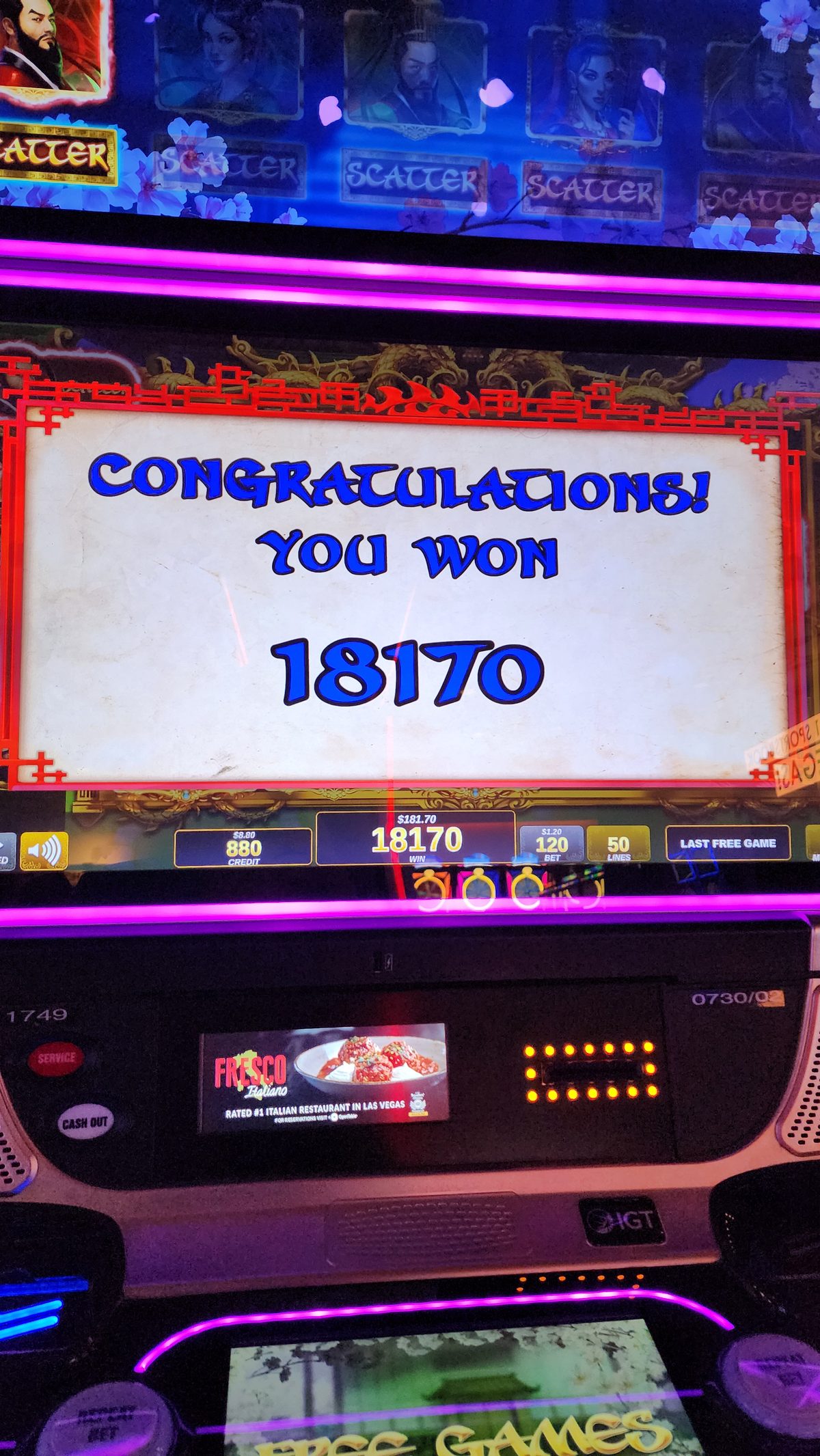 A slot machine screen showing a congratulations win message